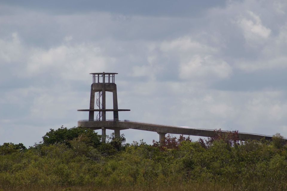 The concrete observation tower at Shark Valley and its long ramp rising above sawgrass