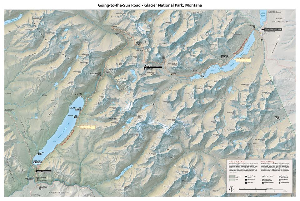A shaded-relief map of Glacier’s mountains with the Going-to-the-Sun Road marked in orange from Lake McDonald over Logan Pass to St. Mary Lake