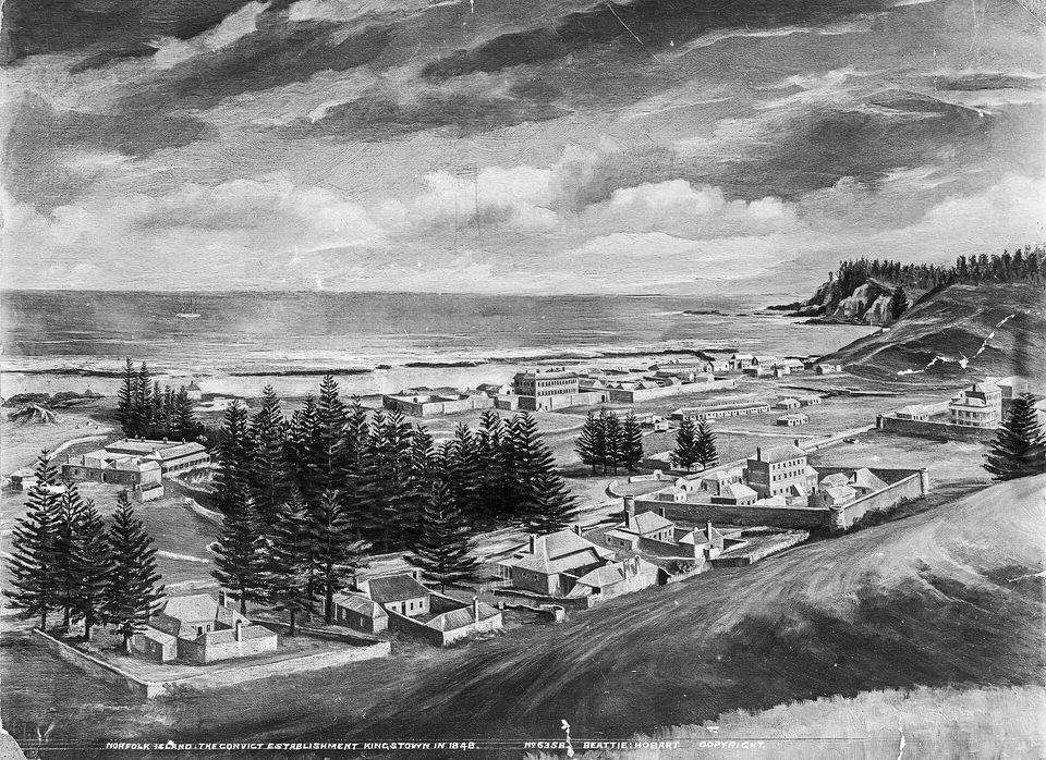 A black-and-white image of a painting: a seaside settlement of stone walls and roofs among tall pines, a ship far out on the water under a heavy sky